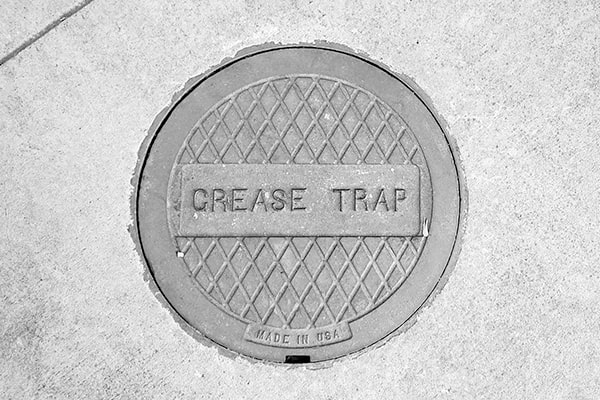 neglecting grease trap pumping can lead to costly plumbing repairs, foul odors, and even fines from municipal authorities